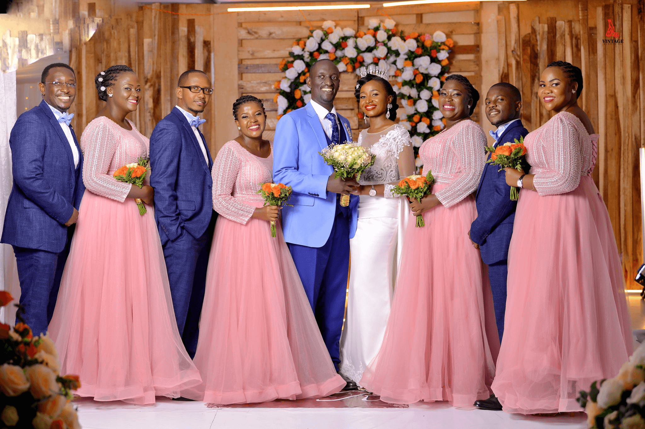 couple and relatives at a wedding ceremony by vintage media and events